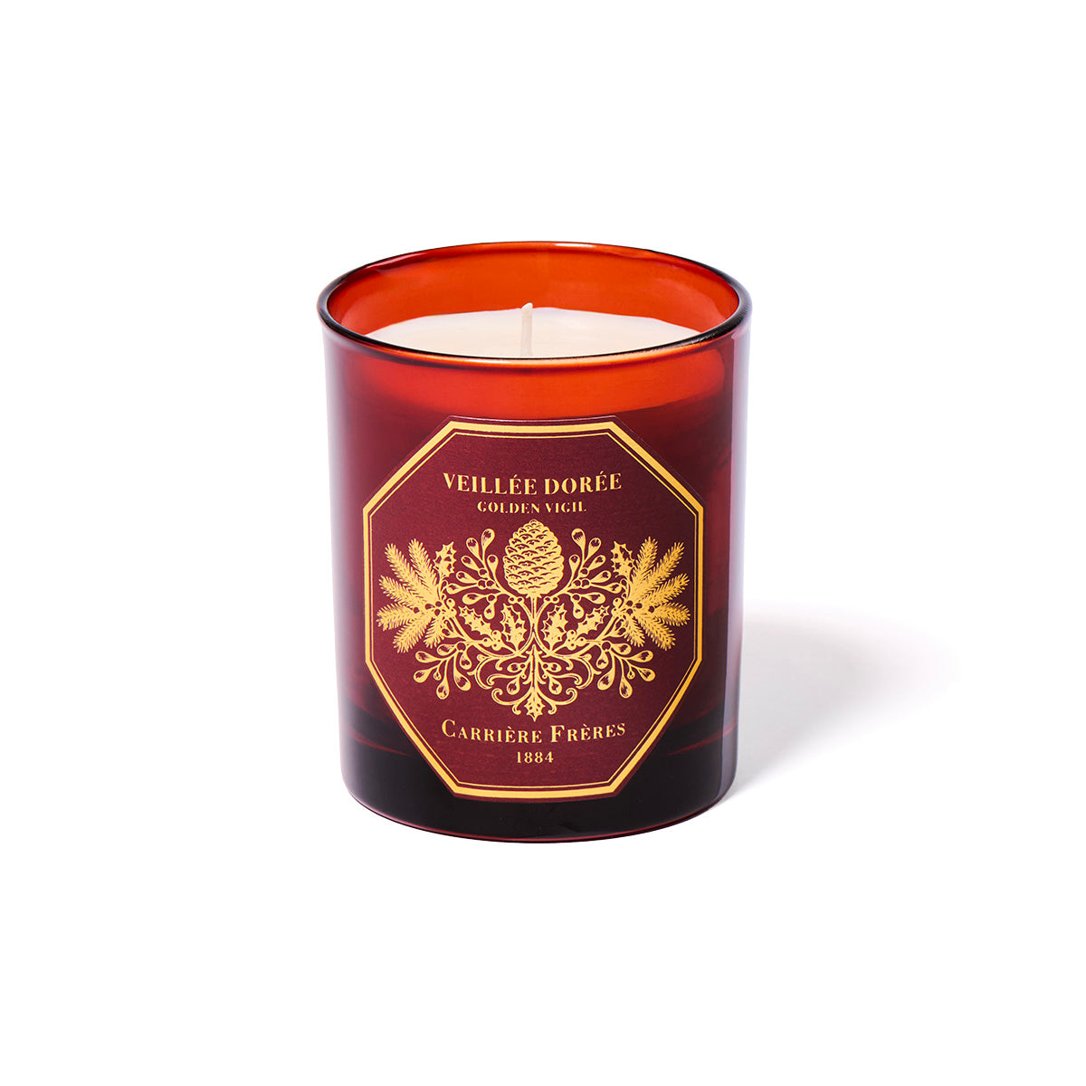 A red glass jar candle with a white wax fill and a prominent gold label reading 'VEILLÉE DORÉE' and 'CARRIÈRE FRÈRES 1884', photographed on a clean white background.