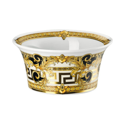 Versace Prestige Gala porcelain bowl featuring a central gold Medusa head framed by black and gold baroque accents. The design includes intricate silver grey flourishes and a Greek key border on a white and gold base