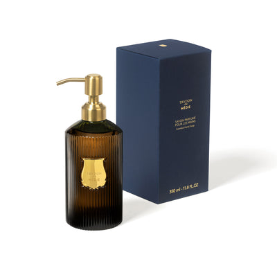 Trudon Médie luxury scented handwash 350ml, presented in an elegant refillable green glass vessel. A bright, citrusy liquid soap with zesty notes of grapefruit, green mandarin, and a heart of Sambac jasmine.