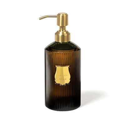 Trudon Médie luxury scented handwash 350ml, presented in an elegant refillable green glass vessel. A bright, citrusy liquid soap with zesty notes of grapefruit, green mandarin, and a heart of Sambac jasmine.