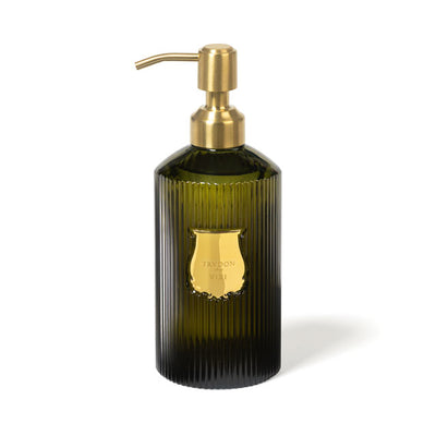 Trudon Vixi liquid hand soap in a signature 350ml fluted green glass bottle with gold pump. A luxury aromatic handwash featuring fresh notes of petitgrain, sage, and sandalwood for a woody, spiritual fragrance.