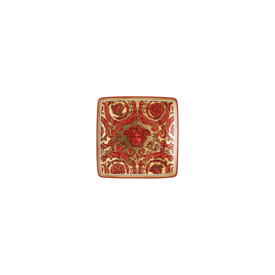 A luxury Versace Medusa Garland small porcelain bowl featuring a vibrant red finish, accented with an intricate gold acanthus leaf border and the iconic gold Medusa head emblem centered at the base.