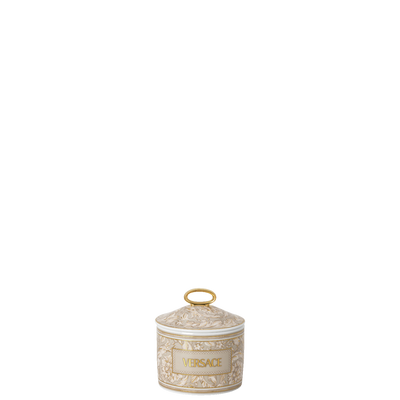 Decorative candle in beige with 'Versace' branding on a white background for Lloyd and Paul Table Luxury